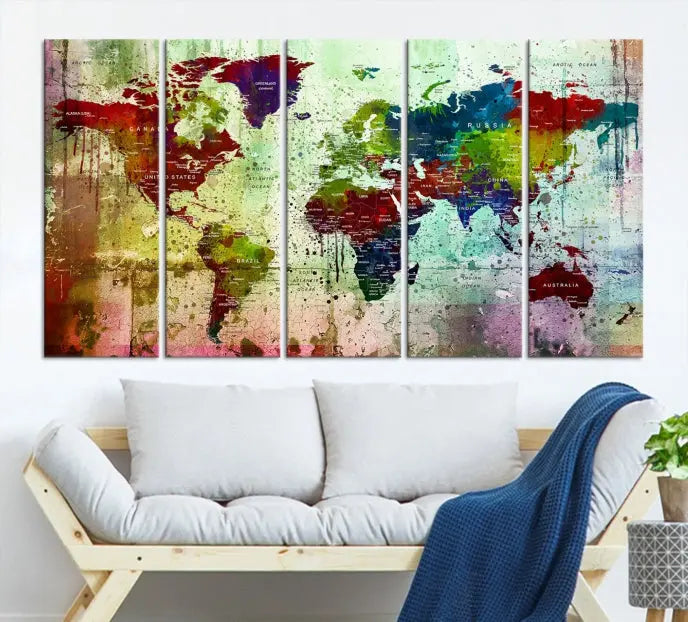 A vibrant Watercolor World Map Wall Art Canvas Print adorns the space above.