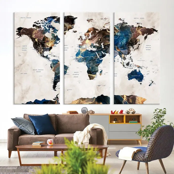 The Watercolor World Map Wall Art Canvas Print, a captivating three-panel artwork with a museum-quality finish and UV-protective coating, is stylishly displayed in the modern room.