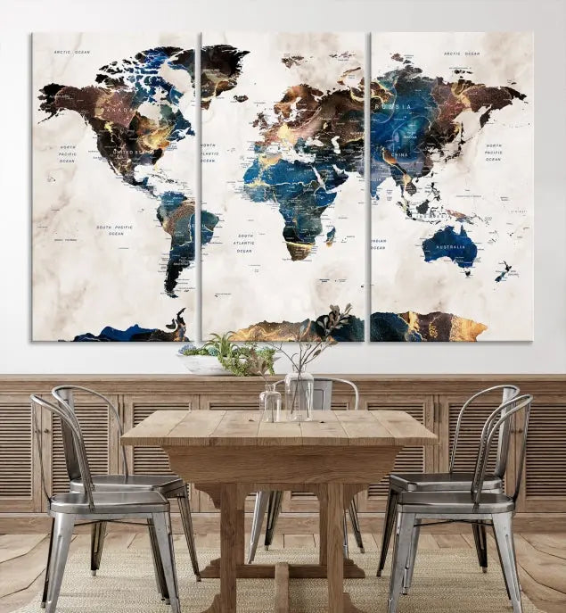 The Watercolor World Map Wall Art Canvas Print, a captivating three-panel artwork with a museum-quality finish and UV-protective coating, is stylishly displayed in the modern room.