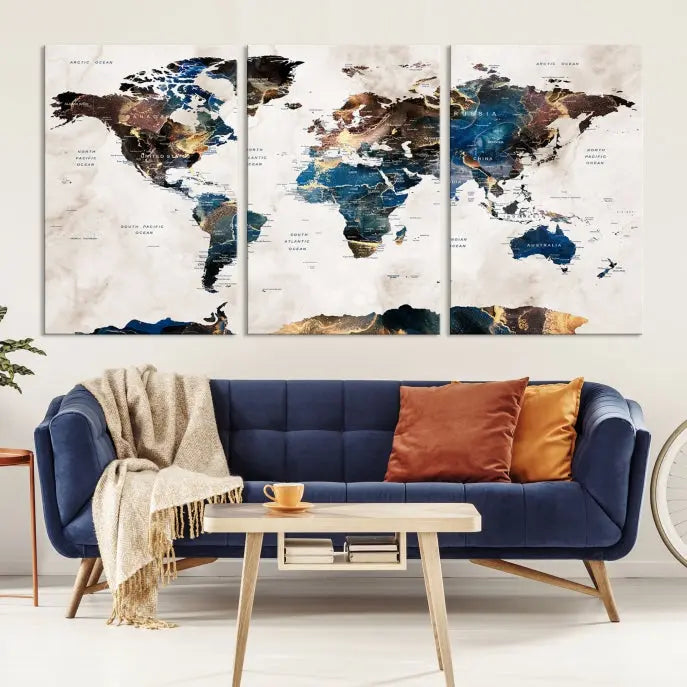 The Watercolor World Map Wall Art Canvas Print, a captivating three-panel artwork with a museum-quality finish and UV-protective coating, is stylishly displayed in the modern room.