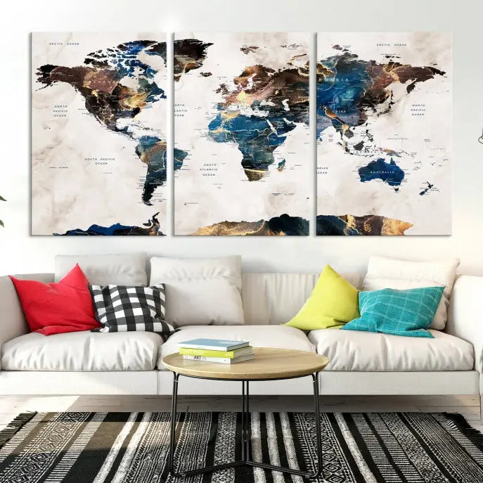 The Watercolor World Map Wall Art Canvas Print, a captivating three-panel artwork with a museum-quality finish and UV-protective coating, is stylishly displayed in the modern room.