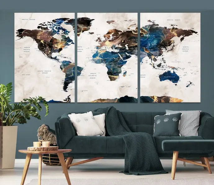 The Watercolor World Map Wall Art Canvas Print, a captivating three-panel artwork with a museum-quality finish and UV-protective coating, is stylishly displayed in the modern room.