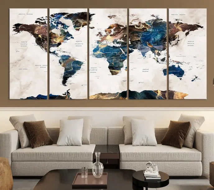 The Watercolor World Map Wall Art Canvas Print, a captivating three-panel artwork with a museum-quality finish and UV-protective coating, is stylishly displayed in the modern room.