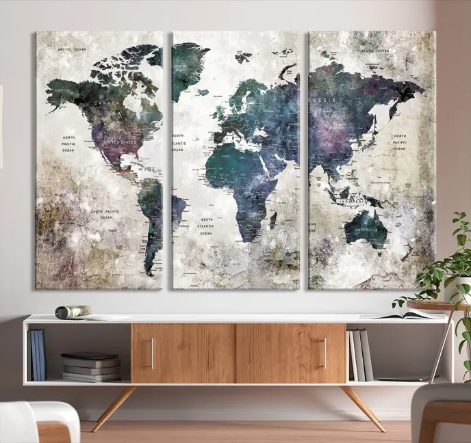 A Watercolor World Map Wall Art Canvas Print, designed in a vintage style on museum-quality canvas, hangs in the modern living room.