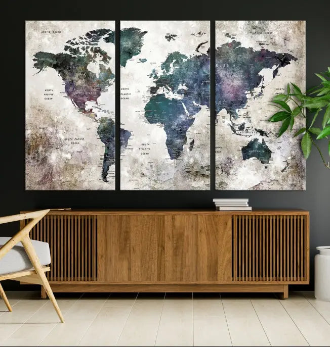 A Watercolor World Map Wall Art Canvas Print, designed in a vintage style on museum-quality canvas, hangs in the modern living room.