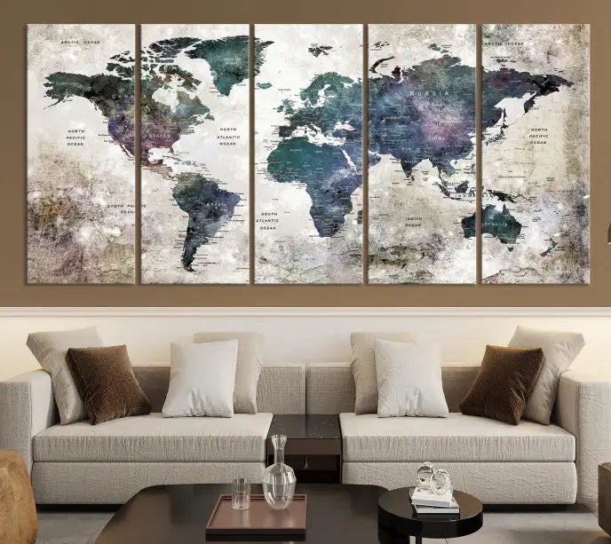 A Watercolor World Map Wall Art Canvas Print, designed in a vintage style on museum-quality canvas, hangs in the modern living room.