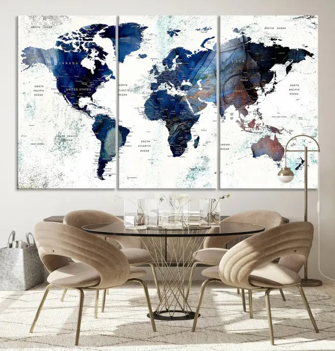 A modern living room showcases a Watercolor World Map Wall Art Canvas Print on the wall, crafted on museum-quality canvas. This artwork adds elegance to the space.