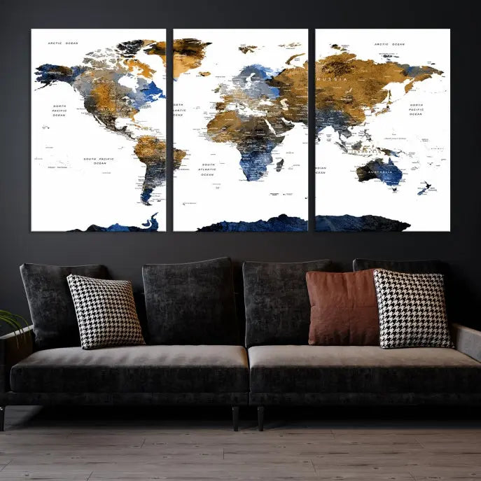 In a modern living room, the "Watercolor World Map Wall Art Canvas Print" is displayed, offering blue and gold tones on museum-quality canvas with UV protection.