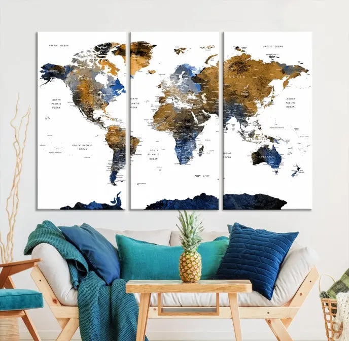 In a modern living room, the "Watercolor World Map Wall Art Canvas Print" is displayed, offering blue and gold tones on museum-quality canvas with UV protection.