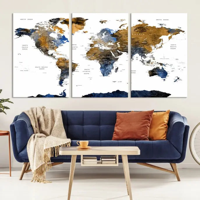 In a modern living room, the "Watercolor World Map Wall Art Canvas Print" is displayed, offering blue and gold tones on museum-quality canvas with UV protection.