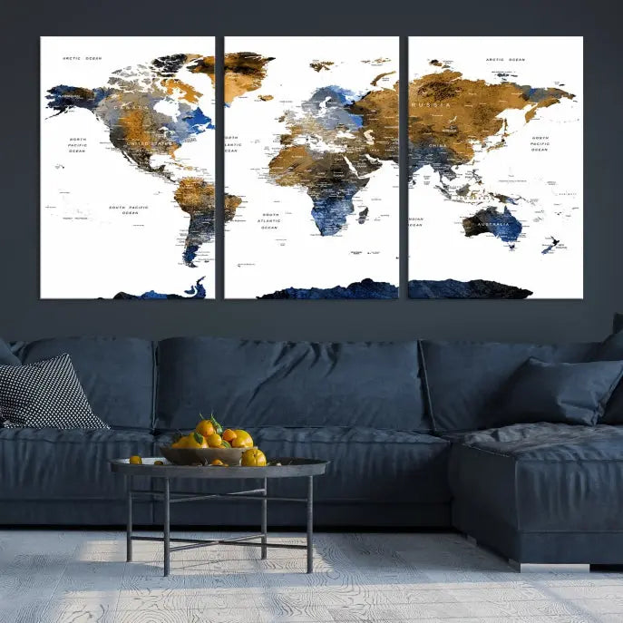 In a modern living room, the "Watercolor World Map Wall Art Canvas Print" is displayed, offering blue and gold tones on museum-quality canvas with UV protection.