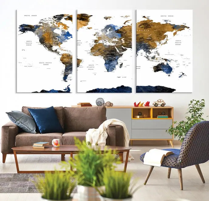 In a modern living room, the "Watercolor World Map Wall Art Canvas Print" is displayed, offering blue and gold tones on museum-quality canvas with UV protection.