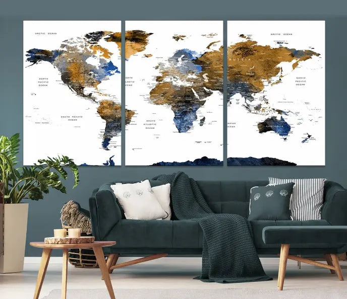 In a modern living room, the "Watercolor World Map Wall Art Canvas Print" is displayed, offering blue and gold tones on museum-quality canvas with UV protection.