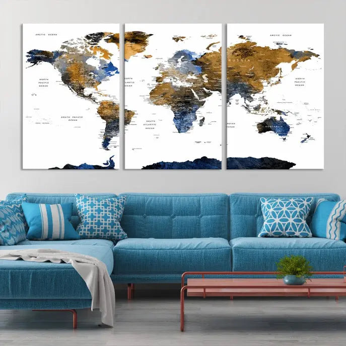 In a modern living room, the "Watercolor World Map Wall Art Canvas Print" is displayed, offering blue and gold tones on museum-quality canvas with UV protection.