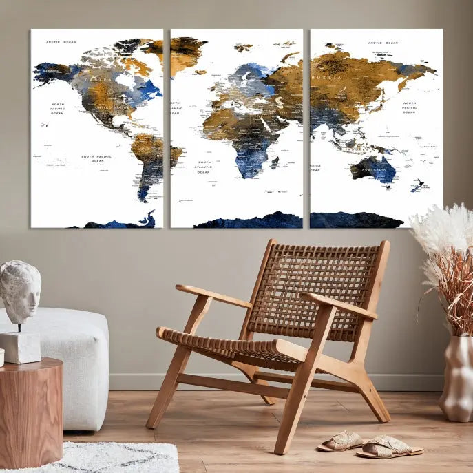 In a modern living room, the "Watercolor World Map Wall Art Canvas Print" is displayed, offering blue and gold tones on museum-quality canvas with UV protection.