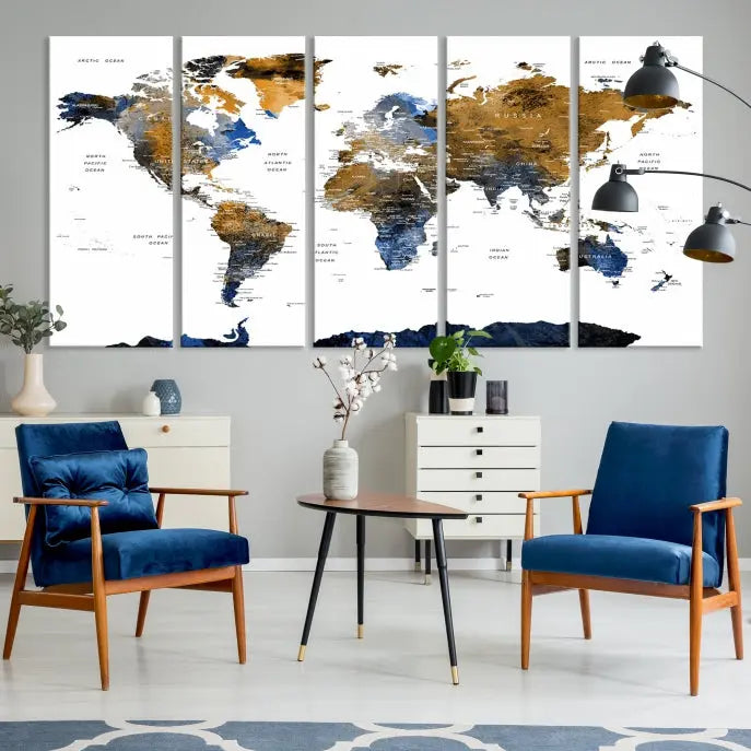 In a modern living room, the "Watercolor World Map Wall Art Canvas Print" is displayed, offering blue and gold tones on museum-quality canvas with UV protection.