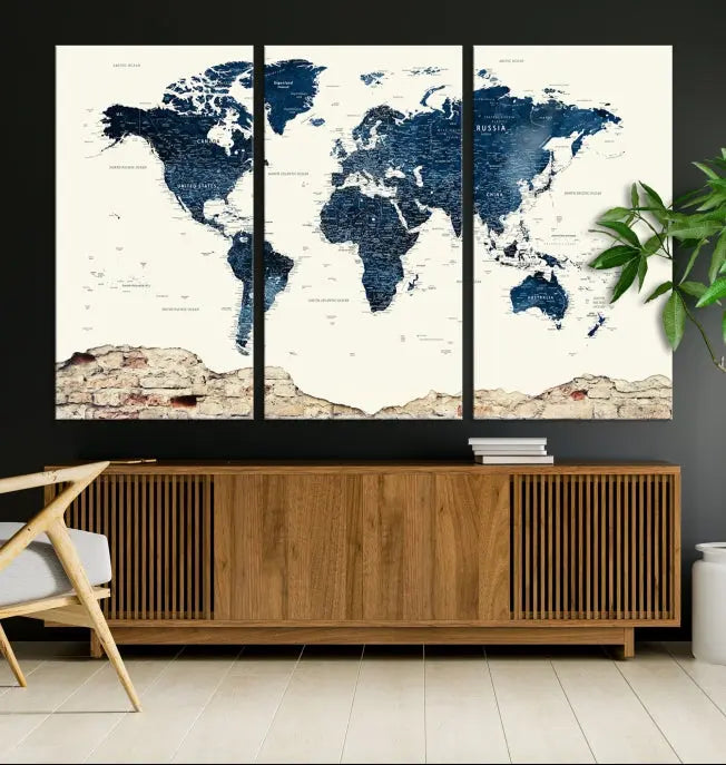 The Watercolor World Map Wall Art Canvas Print, crafted on museum-quality canvas, adorns the wall. Each piece is hand-assembled and features a UV-protective coating to ensure lasting beauty and vibrancy.