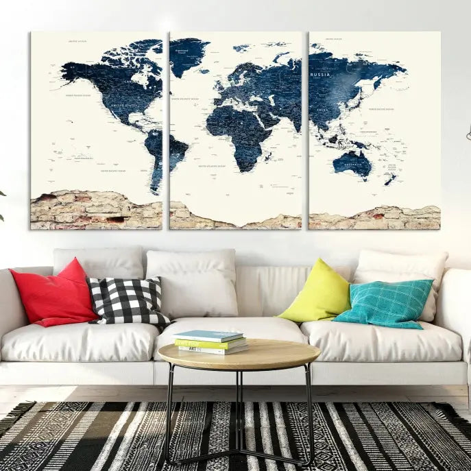 The Watercolor World Map Wall Art Canvas Print, crafted on museum-quality canvas, adorns the wall. Each piece is hand-assembled and features a UV-protective coating to ensure lasting beauty and vibrancy.