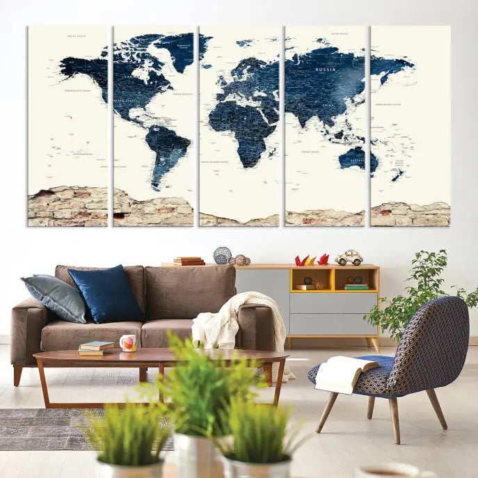 The Watercolor World Map Wall Art Canvas Print, crafted on museum-quality canvas, adorns the wall. Each piece is hand-assembled and features a UV-protective coating to ensure lasting beauty and vibrancy.