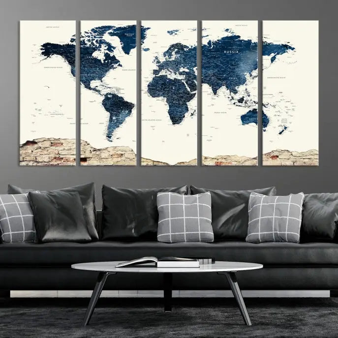 The Watercolor World Map Wall Art Canvas Print, crafted on museum-quality canvas, adorns the wall. Each piece is hand-assembled and features a UV-protective coating to ensure lasting beauty and vibrancy.