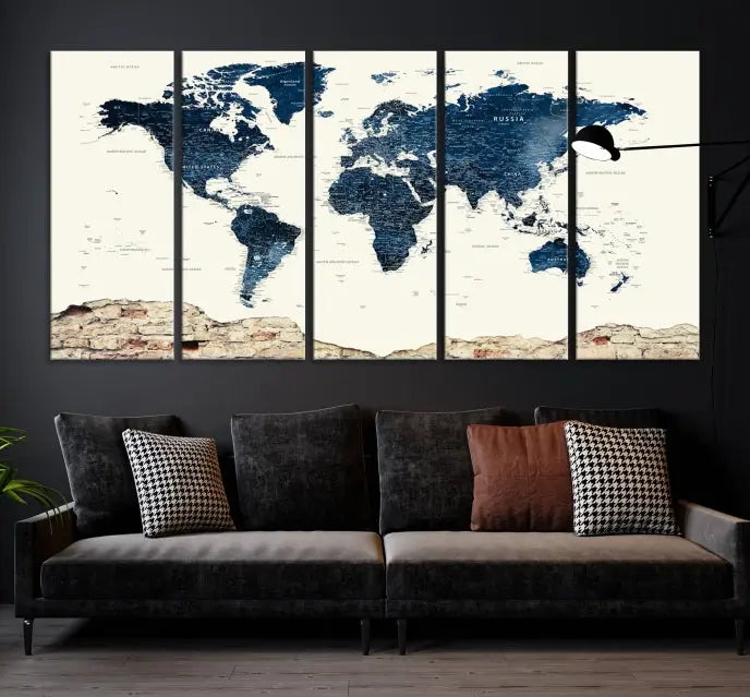 The Watercolor World Map Wall Art Canvas Print, crafted on museum-quality canvas, adorns the wall. Each piece is hand-assembled and features a UV-protective coating to ensure lasting beauty and vibrancy.