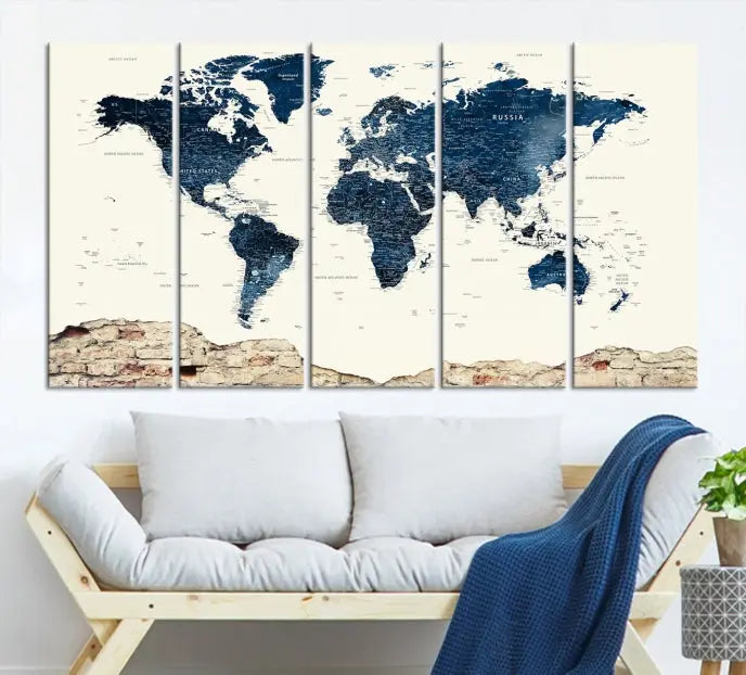 The Watercolor World Map Wall Art Canvas Print, crafted on museum-quality canvas, adorns the wall. Each piece is hand-assembled and features a UV-protective coating to ensure lasting beauty and vibrancy.