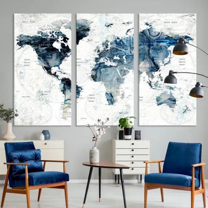 The Watercolor World Map Wall Art Canvas Print, a three-panel abstract masterpiece on museum-quality canvases, adorns the wall.