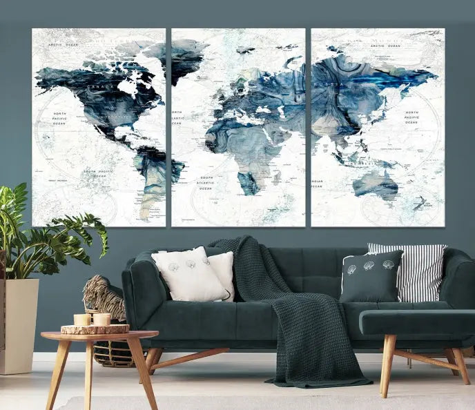 The Watercolor World Map Wall Art Canvas Print, a three-panel abstract masterpiece on museum-quality canvases, adorns the wall.