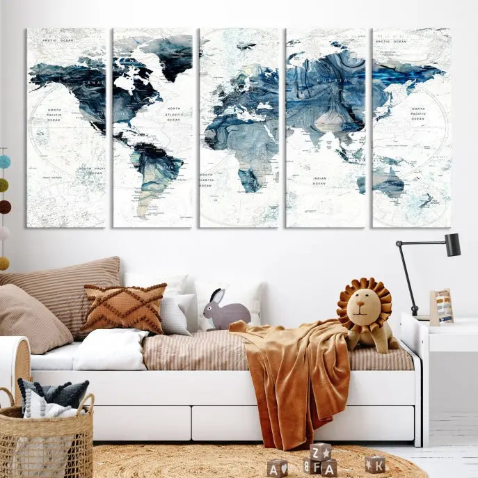 The Watercolor World Map Wall Art Canvas Print, a three-panel abstract masterpiece on museum-quality canvases, adorns the wall.