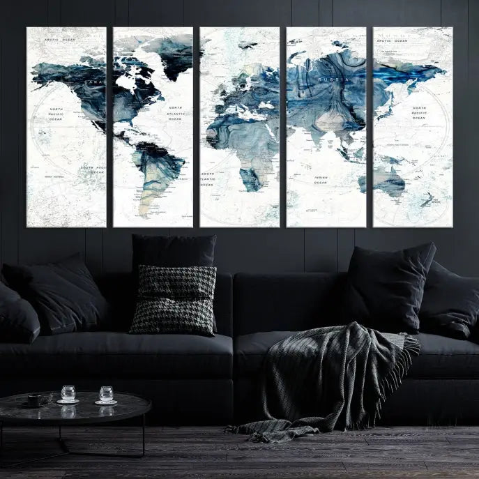 The Watercolor World Map Wall Art Canvas Print, a three-panel abstract masterpiece on museum-quality canvases, adorns the wall.