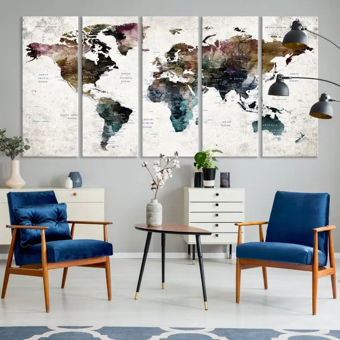 A gallery-wrapped Watercolor World Map Wall Art Canvas Print adorns the wall, printed on museum-quality canvas and finished with a UV-protective coating to preserve its vibrant hues.