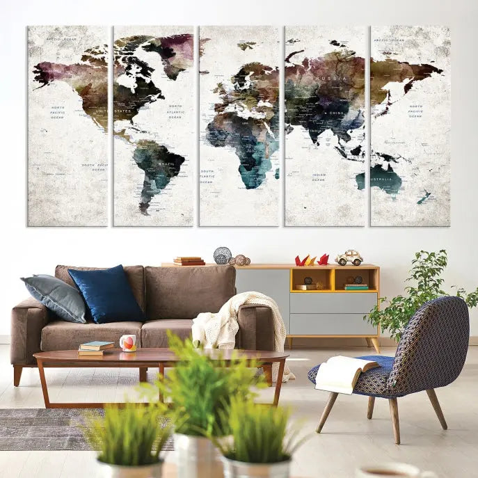 A gallery-wrapped Watercolor World Map Wall Art Canvas Print adorns the wall, printed on museum-quality canvas and finished with a UV-protective coating to preserve its vibrant hues.