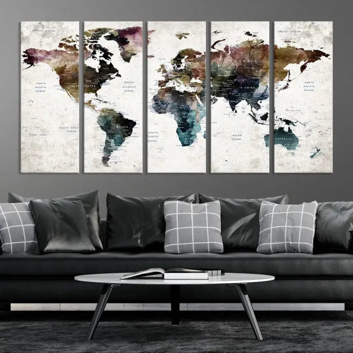 A gallery-wrapped Watercolor World Map Wall Art Canvas Print adorns the wall, printed on museum-quality canvas and finished with a UV-protective coating to preserve its vibrant hues.