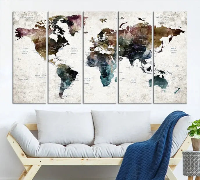 A gallery-wrapped Watercolor World Map Wall Art Canvas Print adorns the wall, printed on museum-quality canvas and finished with a UV-protective coating to preserve its vibrant hues.