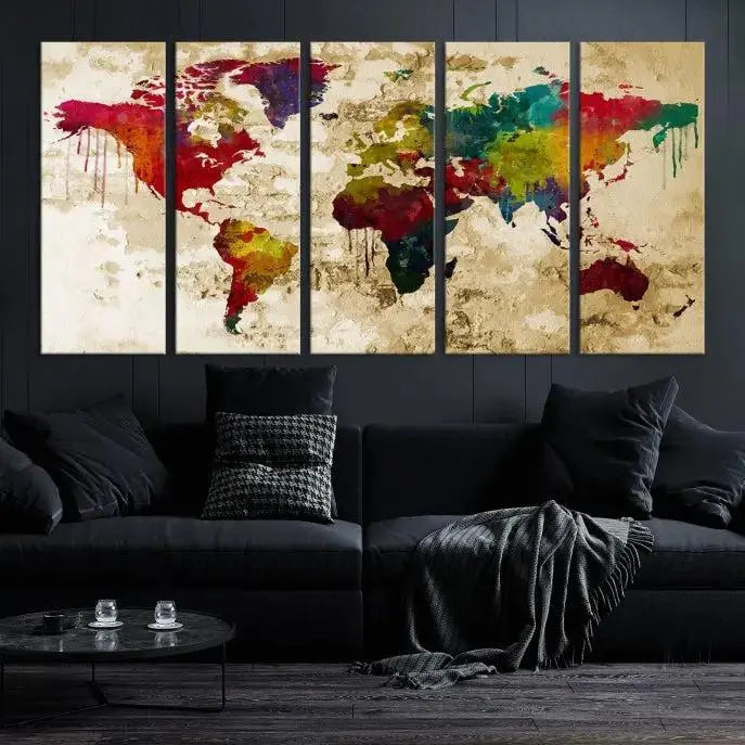 The modern living room features the Watercolor World Map Wall Art Canvas Print adorning the wall. The museum-quality canvas ensures every detail pops and is expertly crafted by professional craftsmen for a polished look that's ready to hang.