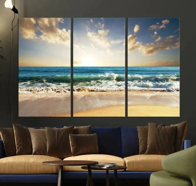 The living room is elevated by museum-quality canvas artwork on the wall: the "Wave on the Beach Wall Art Canvas Print" depicting a beach scene triptych.