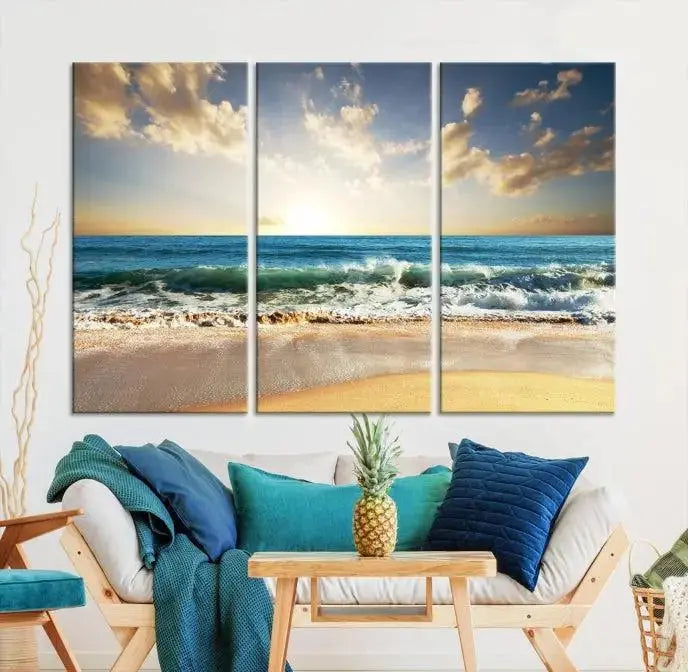 The living room is elevated by museum-quality canvas artwork on the wall: the "Wave on the Beach Wall Art Canvas Print" depicting a beach scene triptych.