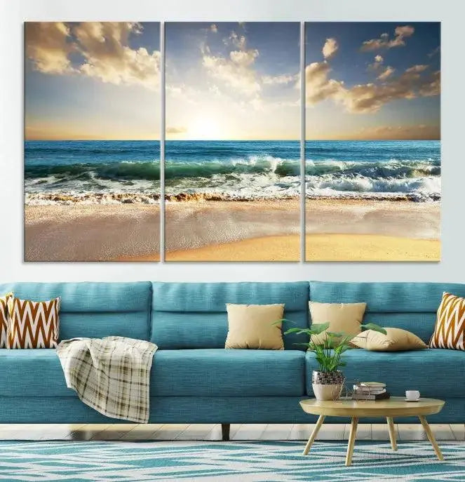 The living room is elevated by museum-quality canvas artwork on the wall: the "Wave on the Beach Wall Art Canvas Print" depicting a beach scene triptych.