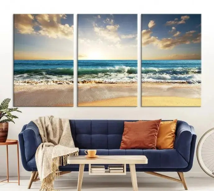 The living room is elevated by museum-quality canvas artwork on the wall: the "Wave on the Beach Wall Art Canvas Print" depicting a beach scene triptych.