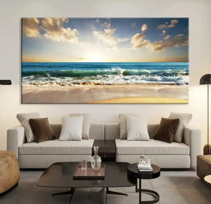 The living room is elevated by museum-quality canvas artwork on the wall: the "Wave on the Beach Wall Art Canvas Print" depicting a beach scene triptych.