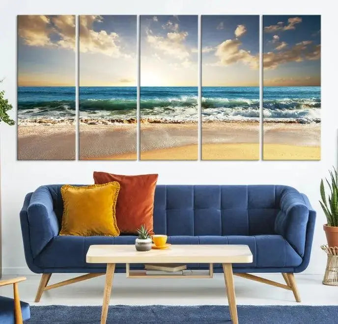 The living room is elevated by museum-quality canvas artwork on the wall: the "Wave on the Beach Wall Art Canvas Print" depicting a beach scene triptych.