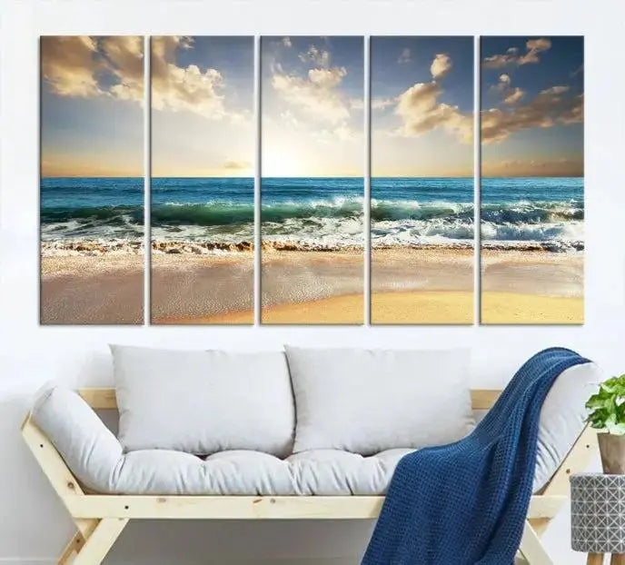 The living room is elevated by museum-quality canvas artwork on the wall: the "Wave on the Beach Wall Art Canvas Print" depicting a beach scene triptych.