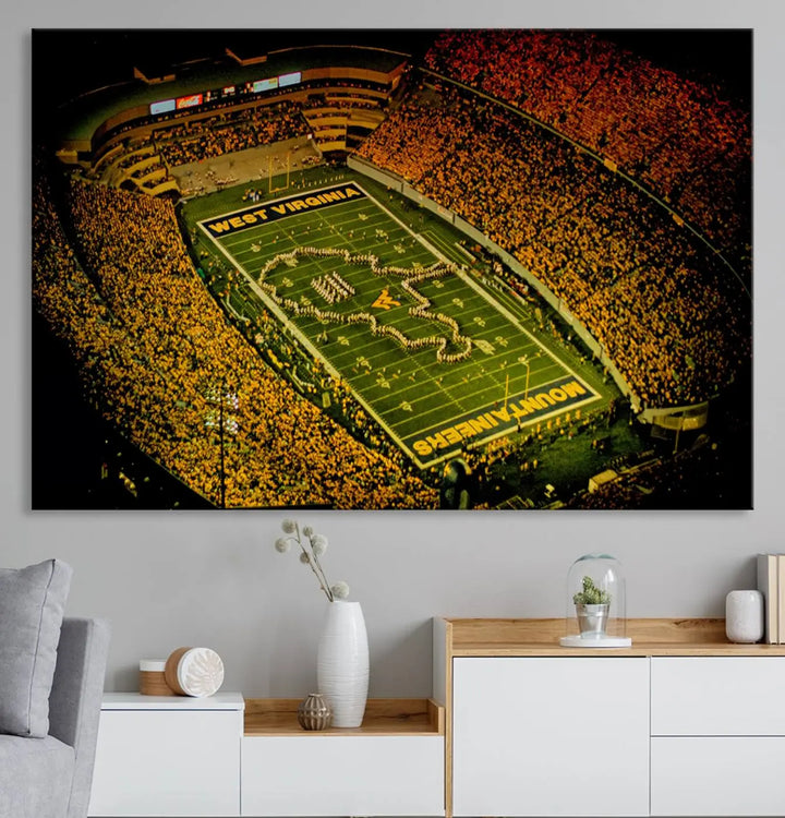 A stunning triptych wall art featuring Milan Puskar Stadium, the home of the West Virginia University Mountaineers football team, is crafted on museum-quality canvas to deliver a captivating effect. This high-resolution print is proudly handmade in the USA and highlights Morgantown City.