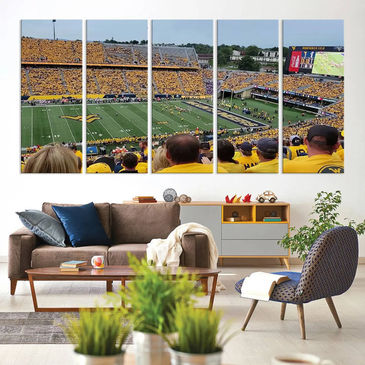 The "West Virginia University Mountaineers Football Team Print" on museum-quality canvas from Morgantown beautifully captures a panoramic view of Milan Puskar Stadium with fans in yellow, fully immersed in the game.