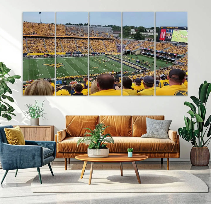 The "West Virginia University Mountaineers Football Team Print" on museum-quality canvas from Morgantown beautifully captures a panoramic view of Milan Puskar Stadium with fans in yellow, fully immersed in the game.