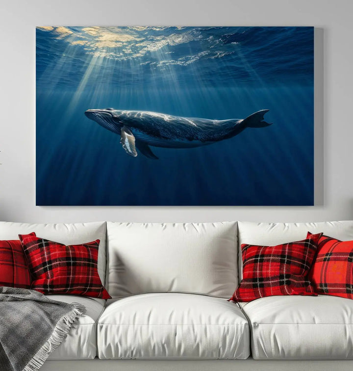 The Whale under Ocean Wall Art Canvas Print adorns the living room wall, capturing a sunlit ocean scene with a gallery-quality finish.