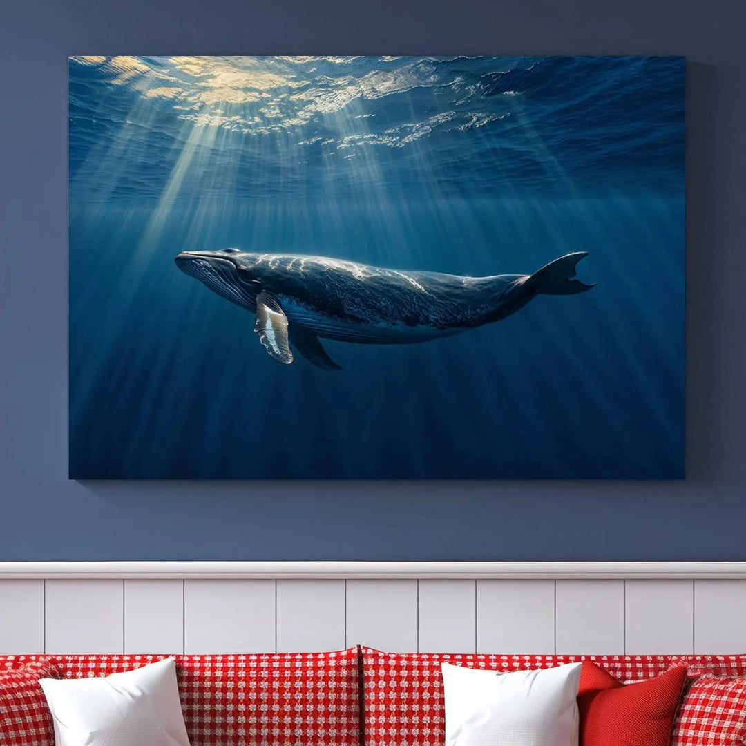 The Whale under Ocean Wall Art Canvas Print adorns the living room wall, capturing a sunlit ocean scene with a gallery-quality finish.