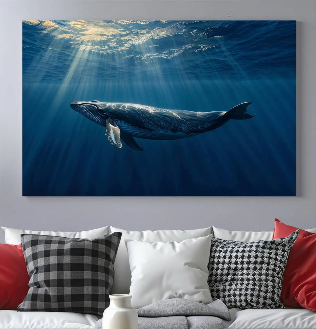 The Whale under Ocean Wall Art Canvas Print adorns the living room wall, capturing a sunlit ocean scene with a gallery-quality finish.