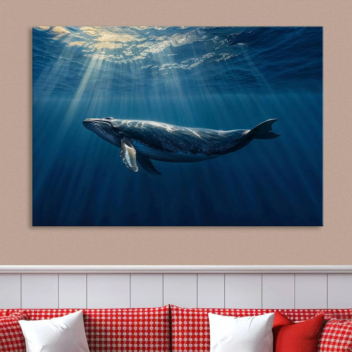 The Whale under Ocean Wall Art Canvas Print adorns the living room wall, capturing a sunlit ocean scene with a gallery-quality finish.