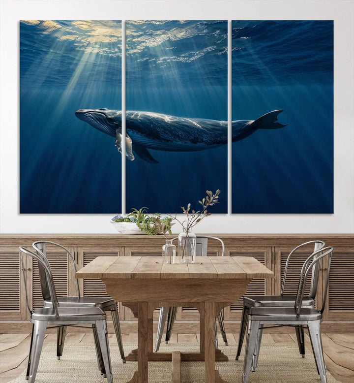 The Whale under Ocean Wall Art Canvas Print adorns the living room wall, capturing a sunlit ocean scene with a gallery-quality finish.